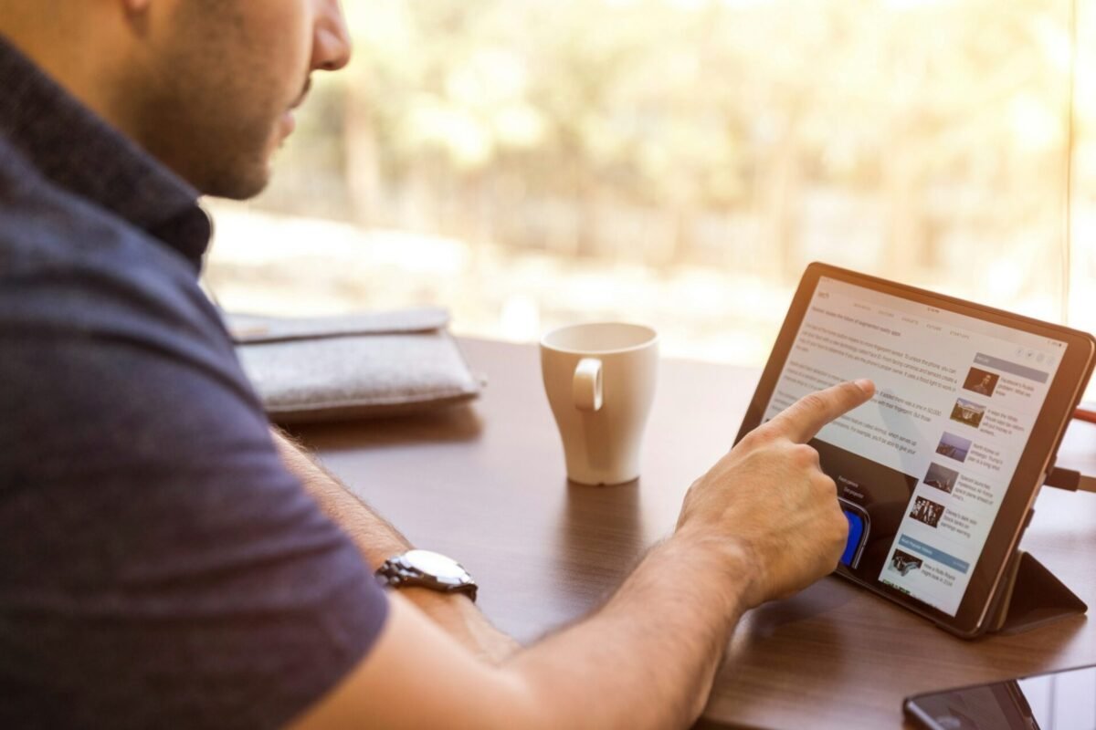 Man Touching Tablet Gadget